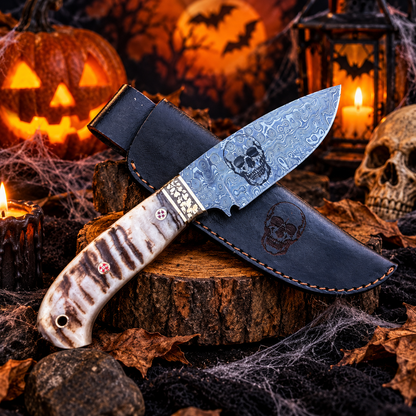 Handcrafted Damascus Steel Collector Knife – Engraved Skull Motif, Ram Horn Handle with Leather Sheath